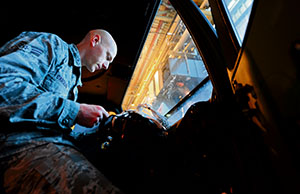 Senior Airman Nathan Carolan, 86th Vehicle Readiness Squadron vehicle maintenance apprentice, works on a wiring issue inside a 1078A1 light mobility terrain vehicle Jan. 9 on Ramstein. Carolan repaired the wiring to fix a no start condition.