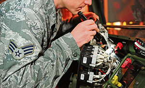 Senior Airman Nathan Carolan, 86th Vehicle Readiness Squadron vehicle maintenance apprentice, works on a wiring issue inside a 1078A1 light mobility terrain vehicle Jan. 9 on Ramstein. Carolan repaired the wiring to fix a no start condition.