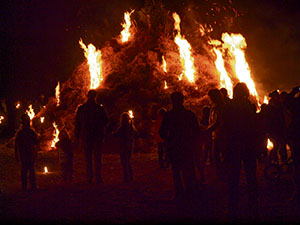 Courtesy photos People watch the "burning of winter" in Olsbrücken. This year's event takes place at 6 p.m. Saturday.