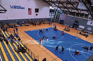 Wrestlers from the Kaiserslautern Raiders warm up before the competition Feb. 9 on Ramstein. The Ramstein Southside Fitness Center hosted the Department of Defense Dependents Schools-Europe sectional wrestling tournament with six teams competing to see which young wrestlers would advance to the European Championship.