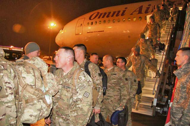 Photo courtesy of 54th Engineer Battalion Public Affairs At the Nuremberg International Airport, Soldiers of 21st Theater Sustainment Command’s 42nd Clearance Company, 54th Engineer Battalion, 18th Engineer Brigade disembark their plane Feb. 12 after a yearlong deployment to Afghanistan.
