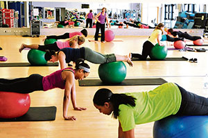 A group of women take a Pilates class Monday at the Ramstein Southside Fitness Center. Pilates focuses on breathing and putting the body back into its natural form of alignment by a set of 34 movements used to work the powerhouse, or core, of your body along with other major muscle groups.