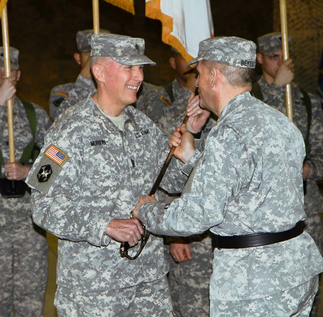 Command Sgt. Maj. James Murrin, the command sergeant major of the 7th Civil Support Command, receives the ceremonial NCO sword from Brig. Gen. Paul M. Benenati, 7th CSC commander, Monday during the 7th CSC’s change of responsibility ceremony.