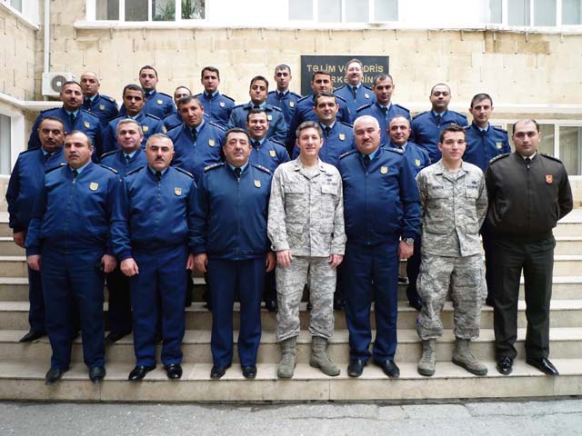 Courtesy photo Airmen from the 435th Contingency Response Group pose for a photo with Azeri military members while visiting Baku, Azerbaijan, from Feb. 18 through 22. The Airmen worked with 24 Azeri air force officers in an exchange event focused on several air base support topics, including safety and accident investigation differences, vehicle management support considerations, and airfield operations core concepts.