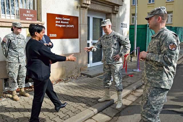 Lt. Gen. Donald M. Campbell Jr., commanding general of U.S. Army Europe, greets Ramona Kausch, the garrison’s education services officer, who oversaw the transition center project. On March 8, Campbell and Kathleen Marin, director of Installation Management Command-Europe Region, visited Kaiserslautern. Lt. Col. Lars Zetterstrom, commander of U.S. Army Garrison Kaiserslautern, and Col. Bryan D. DeCoster, commander of U.S. Army Garrison Baden-Württemberg, showed the senior Army leaders around several posts within the garrison, including Pulaski Barracks, Sembach Kaserne and Kleber Kaserne.
