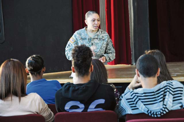 Sgt. 1st Class Erica Stenson, a resiliency trainer and operations NCO for the 21st Theater Sustainment Command’s 266th Financial Management Support Center, speaks to Kaiserslautern High School students about how to be more resilient in their daily lives March 15 at the school.