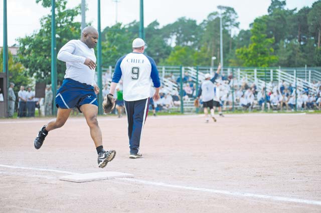 Photo by Senior Airman Timothy MooreCol. Lawrence Hicks, 86th Logistics Group commander, runs to first base during an outfield hit Sep. 11 on Ramstein. Hicks was part of the RUfit Resilience Day Chiefs vs. Eagles game.