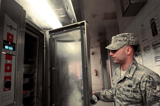 Senior Airman Jonathan DaSilva, 786th Force Support Squadron food service journeyman, opens a steamer Oct. 8 in Ramstein’s Rhineland Inn Dining Facility to check the status of the food. The Rhineland Inn Dining Facility is open seven days a week, year-round to serve the needs of Ramstein’s Airmen.