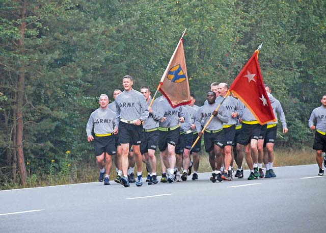 Photo by Staff Sgt. Warren W. Wright Jr.Maj. Gen. John R. O’Connor, commanding general of the 21st Theater Sustainment Command, leads a formation run with the Soldiers of the 21st TSC Aug. 29 on Rhine Ordnance Barracks. Soldiers from the 21st TSC gathered in the early morning hours to run as an organization as a way to develop esprit de corps and build lasting bonds.
