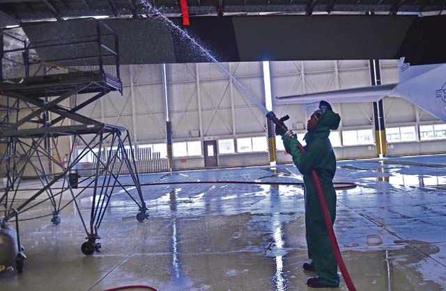 An Airman from the 86th Aircraft Maintenance Squadron rinses a wing of a C-130J Super Hercules with water. Aircraft washing is a vital part of the mission, and if C-130Js are not washed regularly, they can begin to corrode and cause damage yielding it unsafe to operate. As Airmen perform washing procedures, safety is paramount. 