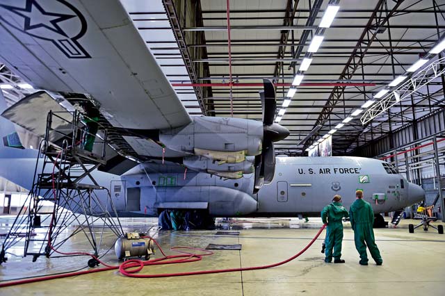 Two Airmen from the 86th Aircraft Maintenance Squadron assess a C-130J Super Hercules before washing it. All C-130Js at Ramstein are washed regularly for corrosion prevention and control. Keeping major structural components clean helps improve the life span of aircraft, thus keeping them operational longer.