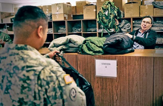 U.S. Army photo  A Soldier turns in clothing and individual equipment at the Kaiserslautern Central Issue Facility, one of several locations where a more efficient inventory management system was put in place. 