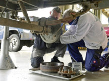 Alexander Geimer, left, and Joerg Engel, both 86th Vehicle Readiness Squadron general purpose heavy mechanics, install a brake assembly on a military tactical trailer at Ramstein Air Base, June 19. Geimer and Engel work with the 86th VRS, which addressed vehicle parts supply challenges by establishing a partnership with local Army supply.