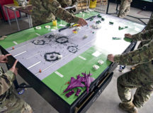 U.S. Air Force Airmen participate in a tabletop demonstration during Silver Flag at Ramstein Air Base, July 10. The 435th Construction and Training Squadron used the tabletop demonstration to train Airmen in rapid airfield damage recovery. Silver Flag is a contingency training course consisting of seven training days and two field exercise days for U.S. Air Force civil engineers, force support and vehicle operator personnel.