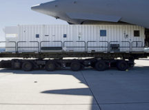 A Negatively Pressurized Conex sits on a k-loader after 721st Aerial Port Squadron personnel unloaded it from a C-17 Globemaster III at Ramstein Air Base, June 24. The NPC is a more durable system than the existing Transport Isolation System. The NPC is an infectious disease containment unit designed to minimize contamination risk to aircrew and medical attendants, while allowing in-flight medical care for patients afflicted by diseases like COVID-19. Photo by Senior Airman Milton Hamilton