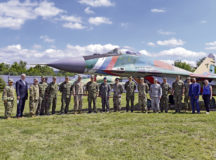 Leadership from the Slovak air force and U.S. Air Forces in Europe and Air Forces Africa pose for a photo in front of a Slovak air force MiG-29 static display before attending force development engagement briefings at Sliač Air Base, Slovakia, July 28. In 2018, the Slovak Ministry of Defense announced its largest defense purchase of 14 F-16 Block 70/72 to replace aging MiG-29 fighters.