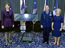 Secretary of the Air Force Barbara M. Barrett, left, Air Force Chief of Staff David L. Goldfein and Mrs. Dawn Goldfein pose with a representation of an etching that is now displayed on the Wall of Valor at the Air Force Memorial during a ceremony at Joint Base Anacostia-Bolling, Washington, D.C., July 31. The ceremony unveiled a new etching for the memorial’s Wall of Valor at the Air Force Memorial that reads, “This is our sacred duty. When protecting Soldiers, Sailors, Airmen and Marines, we fly to the sound of the guns … or we die trying.” Photo by Wayne Clark