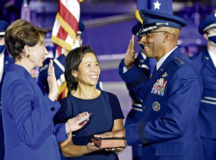 Secretary of the Air Force Barbara M. Barrett administers the oath of office to incoming Air Force Chief of Staff Gen. Charles Q. Brown, Jr. during the CSAF Transfer of Responsibility ceremony at Joint Base Andrews, Md., Aug. 6. Brown is the 22nd Chief of Staff of the Air Force. Photo by Wayne Clark