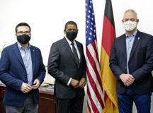 Marcus Klein, Ramstein-Miesenbach Union Community deputy mayor, left; U.S. Air Force Maj. Gen. Randall Reed, 3rd Air Force commander and Kaiserslautern Military Community commander, center; and Ralf Hechler, Ramstein-Miesenbach Union Community mayor, pose for a photo at the German American Community Office, Kaiserslautern, Germany, Dec. 2, 2020. Reed met with community leaders to pursue dialogue and cooperation on a wide range of community-related matters. (U.S. Air Force photo by Staff Sgt. Devin Boyer)