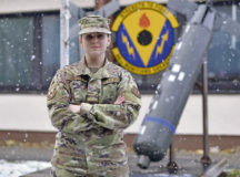U.S. Air Force Airman 1st Class Taylor Harris, 86th Munitions Squadron custody account technician, poses for a photo in front of the 86th MUNS building at Ramstein Air Base, Germany, Jan. 8, 2021. Harris was recognized as Airlifter of the Week for providing premier customer support for munitions accounts spanning across the 86th Airlift Wing and five geographically separated units. (U.S. Air Force photo by Senior Airman John R. Wright)