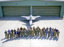 Air force delegates from multiple Eastern European U.S. partner nations pose for a group photo during a European Partnership Flight event at Kecskemét Air Base, Hungary, June 7, 2021. USAFE-AFAFRICA and the Hungarian air forces cohosted the week-long event, where discussions focused on the Agile Combat Employment concept. (U.S. Air Force photo by 2nd Lieutenant Ridge Miller)