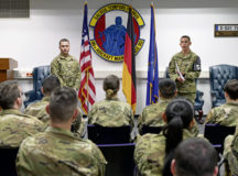 U.S. Air Force Staff Sgt. Madison Alicea, 569th U.S. Forces Police Squadron unit training instructor, right, briefs Airmen from the 86th Aircraft Maintenance Squadron during a DUI/DWI wet lab training before demonstrating Standardized Field Sobriety Tests with Airman 1st Class Chanz Pratt, 86th AMXS C-130 aircraft maintenance apprentice, left, at Ramstein Air Base, Germany, Nov. 15, 2021. The wet lab consisted of volunteers who were provided alcohol under supervision to show the direct impact alcohol consumption has on various body compositions and the risks of driving under the influence of alcohol. (U.S. Air Force photo by Senior Airman John R. Wright)