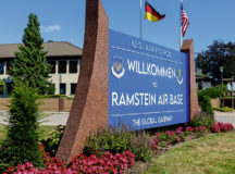 The newly installed welcome sign on display at Ramstein Air Base, Germany, Sept. 2, 2021. The front of the new welcome sign contains both the 86th Airlift Wing and U.S. Air Forces in Europe – Air Forces Africa crest. (U.S. Air Force photo by Airman Edgar Grimaldo)