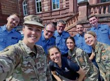 Members from the Kaiserslautern Polizei, 21st Theater Sustainment Command, a 21st TSC Bundeswehr Liaison and American Forces Network Europe pose for a selfie commemorating the first meeting between the organizations. The group will continue to meet quarterly to help address concerns within the community and create outreach videos to bridge the gap between the Kaiserslautern police and American population. (U.S. Army Photo by: Staff Sgt. Jessica Forester, 7th Mission Support Command)