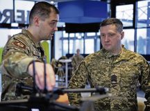 U.S. Air Force Senior Airman Thomas Kozub, left, 355th Comptroller Squadron financial analyst, explains to Chief Master Sgt. of the Air Force of the Armed Forces of Ukraine Kostiantyn Stanislavchuk, the drone capabilities at the Hercules Innovation Lab at Ramstein Air Base, Germany, March 8, 2023. Chief Stanislavchuk visited various USAF education and training institutions around the Kaiserslautern military community to discuss future education and training opportunities for Ukrainian Armed Forces non-commissioned officer corps. (U.S. Air Force photo by Airman 1st Class Jared Lovett)
