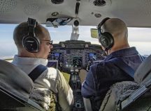 Maj. Kirk Schlueter, 76th Airlift Squadron aircraft commander, left, and Maj. Tyler Neidecker, 76th AS co-pilot, fly a C-21 Learjet from Ramstein Air Base, Germany, to Vilnius International Airport, Lithuania, April 6, 2023. The 76th AS worked with the 86th Aeromedical Evacuation Squadron to provide medical evacuation training, patient transports and flying support. Both units aided in the U.S. Air Force’s first-ever AE paramedic-led flight in charge of an all-enlisted medical crew, which provided greater numbers to the fight. (U.S. Air Force photo by Airman 1st Class Jordan Lazaro)