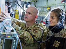 U.S. Air Force Lt. Col. Daniel Moseley, 86th Critical Care Air Transport Team physician, and Polish air force 2nd Lt. Magdalena Gaswlowska-Baran, 8th Airlift Base physician, review patient care procedures during exercise DEFENDER 23 en-route to Mihail Kogălniceanu Air Base, Romania, June 6.