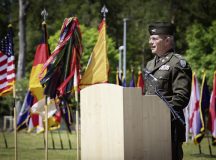 U.S. Army Col. Martin Cheman, deputy commanding officer, 21st Theater Sustainment Command, speaks at the Memorial Day Ceremony at Panzer Field, Panzer Kaserne,, Kaiserslautern, on May 25. Memorial Day was first observed on May 30, 1868, and officially proclaimed on May 5, 1897,  by General John Logan, national commander of the Grand Army of the Republic. Memorial Day is a holiday that is held to honor fallen Service Members.