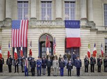 Representatives of the French and United States Militaries stand in front of the Hotel de Ville de Chalons-en-Champagne, the city hall of the town, concluding the Armistice Day 105th Anniversary Celebration in Chalons-en-Champagne, France on Nov. 11, 2023. The celebration encompassed both the 105th Anniversary of the Armistice signing and the 100th anniversary of the lighting of the Flame of Remembrance at the Tomb of the Unknown Soldier at the Arc de Triomphe in Paris, France. (U.S. Army photo by Spc. Samuel Signor)