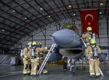 Firefighters assigned to the 39th Civil Engineer Squadron conduct a simulated unconscious pilot rescue operation during a crash, damaged, or disabled aircraft recovery exercise at Incirlik Air Base, Türkiye, Jan. 8.