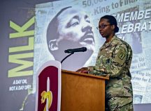 U.S. Army Capt. Mary Johnson, commander of the Headquarters and Headquarters Company, 30th Medical Brigade, gives remarks at the Martin Luther King Jr. Day observance, which was hosted by the 30th Medical Brigade at Tiger Theater, Sembach Kaserne, Germany, on Jan. 16, 2024. The theme for MLK Day remains “Remember, Celebrate, Act: A Day on Not a Day Off.” Johnson spoke about MLK’s life and achievements, emphasizing how he was a pillar of his community and preached the importance of peace and prosperity. He saw the turmoil of segregation and how he organized marches and peaceful protests to inspire those around him. (U.S. Army photo by Spc. Samuel Signor)