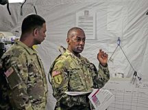 U.S. Army Col. William Washington, Public Health Command Europe director of health and human services, speaks on symptoms for acute radiation syndrome during Vigorous Warrior 24, at Bakonykúti Training Area, Hungary, May 5.