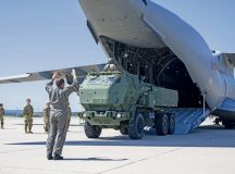 Belgian Air Component Warrant Officer Roly Hartwell, 20th Squadron Transport Conversion Unit loadmaster instructor, guides a
U.S. Army National Guard M142 High Mobility Artillery Rocket System on a Belgian A400M Atlas as part of a High Mobility Artillery Rocket System Rapid Infiltration (HIRAIN) training operation at Ramstein Air Base, July 29. The HIMARS was transported to Chievres Air Base, Belgium, where crews tested their ability to quickly deploy, effectively engage targets and redeploy, ensuring world-wide combat capability. Photo by Senior Airman Brenden Beezley