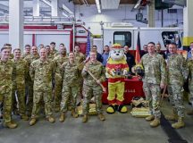 86th Airlift Wing leadership pose for a group photo with military personnel assigned to the 86th Civil Engineer Squadron at Ramstein Air Base, Germany, Oct. 2, 2024. U.S. Air Force Lt. Col. Katherine M. Paulson, 86th Civil Engineer Squadron commander and fire marshal, proclaimed Williams as the honorary fire marshal, and as fire marshal, Williams has declared Oct. 5-19, as the 2024 fire prevention week. (U.S. Air Force photo by Senior Airman Edgar Grimaldo)