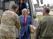 U.S. Air Force Chief Master Sgt. Louis Ludwig, 86th Airlift Wing command chief, left, and U.S. Air Force Col. Bret Echard, 86th Operations Group commander, right, greet Alan Meltzer, U.S. Chargé d'Affaires, U.S. Embassy Berlin, center, at Ramstein Air Base, Germany, Nov. 1, 2024. Echard and Ludwig both gave insight on the day-to-day operations and unique challenges faced by the 86th AW, which gave Meltzer a greater understanding of the Wing’s priorities and mission. (U.S. Air Force photo by Airman 1st Class Trevor Calvert)