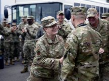 U.S. Air Force Brig. Gen. Adrienne L. Williams, 86th Airlift Wing commander, congratulates U.S. Air Force Senior Master Sgt. David Hardy, 86th Munitions Squadron materiel flight chief, on his promotion to Chief Master Sergeant at Ramstein Air Base, Germany, Nov. 7, 2024. Chief Master Sergeants and 86th Airlift Wing leadership traveled to surprise Airmen at multiple units with the news of their selection for promotion to Chief Master Sergeant. (U.S. Air Force Photo by Senior Airman Jared Lovett)