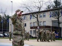 U.S. Air Force Tech. Sgt. Luke Hodge, 86th Vehicle Readiness Squadron material control section chief, leads a salute at Kapaun Air Station, Germany, Nov. 21, 2024. The national anthem was played at the start of a combat graduation for Kisling Noncommissioned Officer Academy class 25-A. NCOA is a resident Community College of the Air Force affiliated course that consists of 196 hours of classroom instruction delivered over 25 academic days. (U.S. Air Force photo by Senior Airman Brenden Beezley)